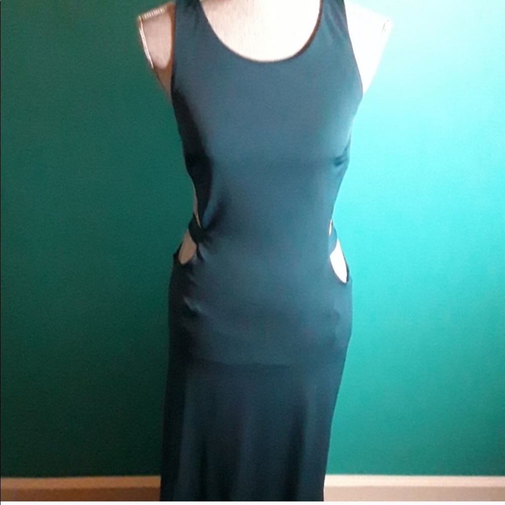 Green sexy gown , backless with open sides